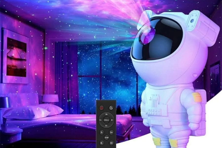 projetor de luz da galáxia do astronauta